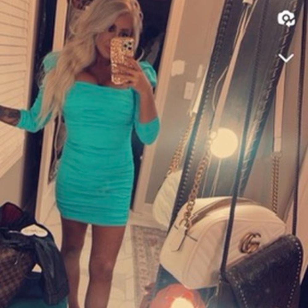 Tried this on for a friend boutique and never wore after that! New with tags